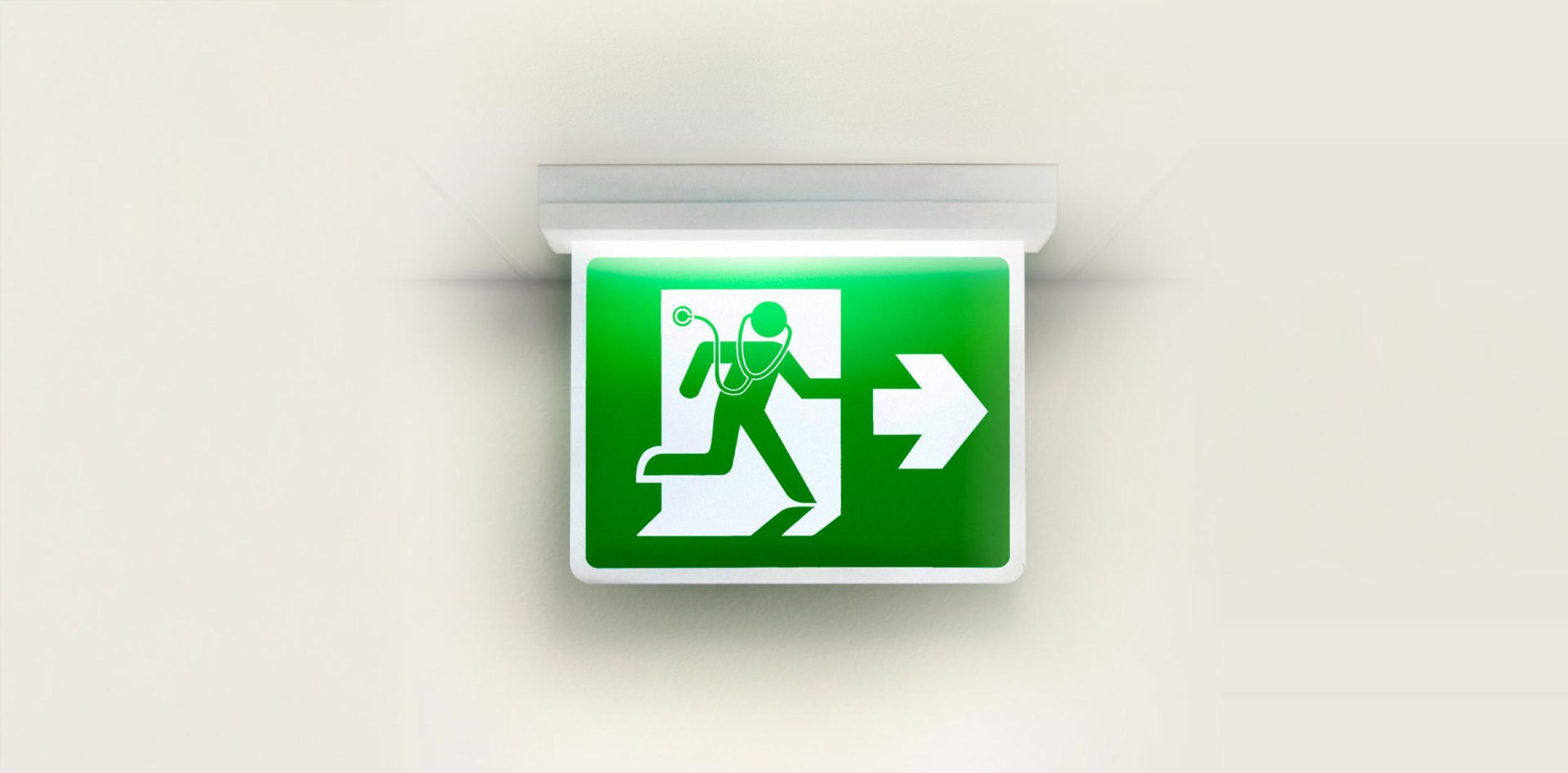 A green fire exit sign