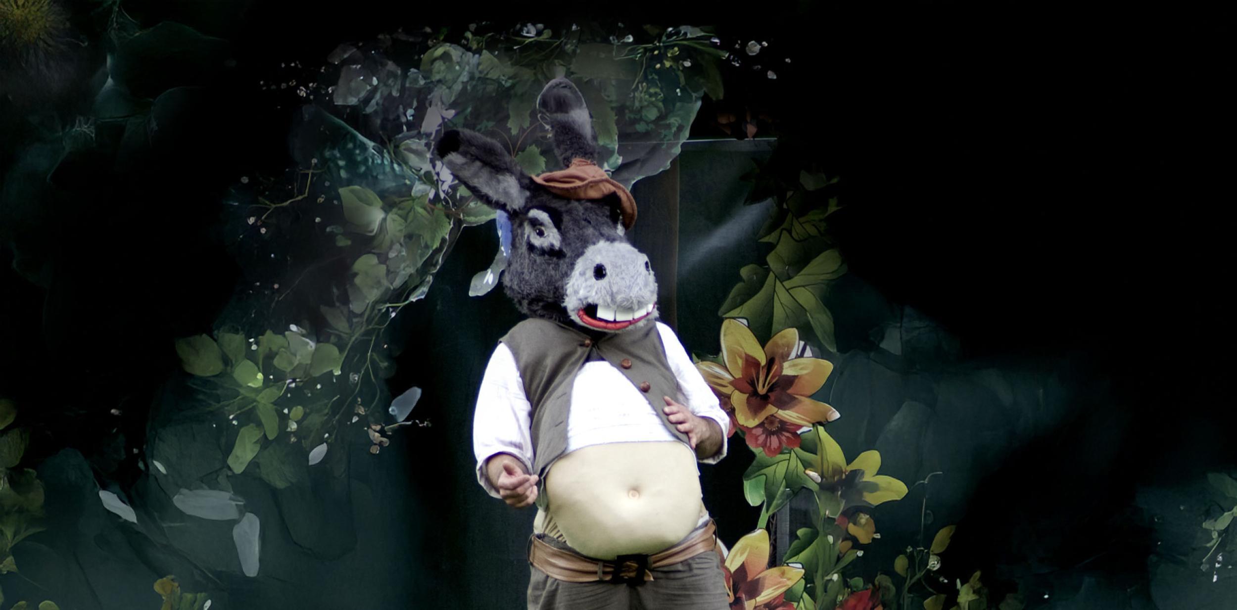 A person wearing a donkey costume