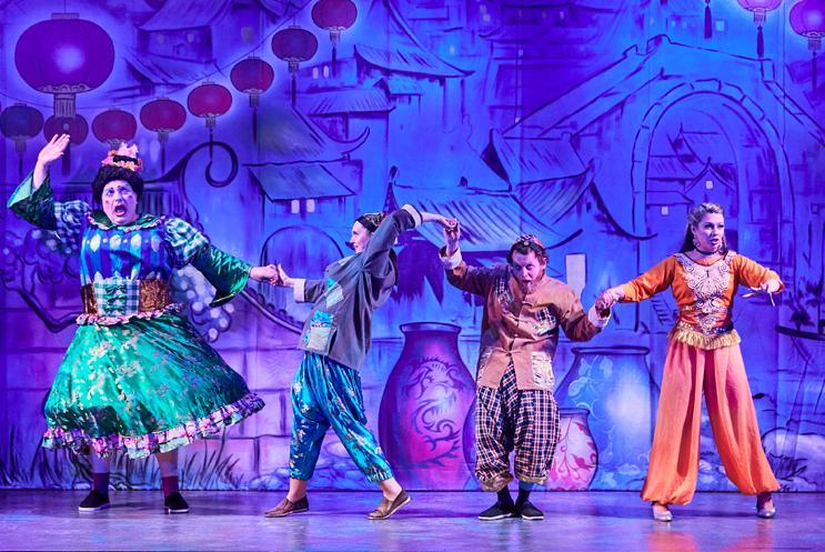 panto characters dancing on stage